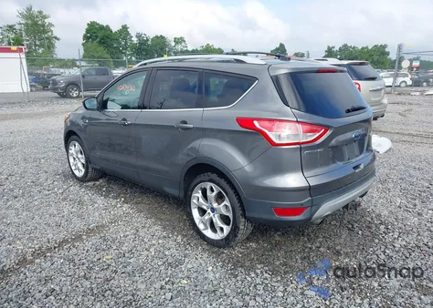 2013 Ford Escape Titanium z USA, uszkodzony, nr VIN 1FMCU9J96DUD84900